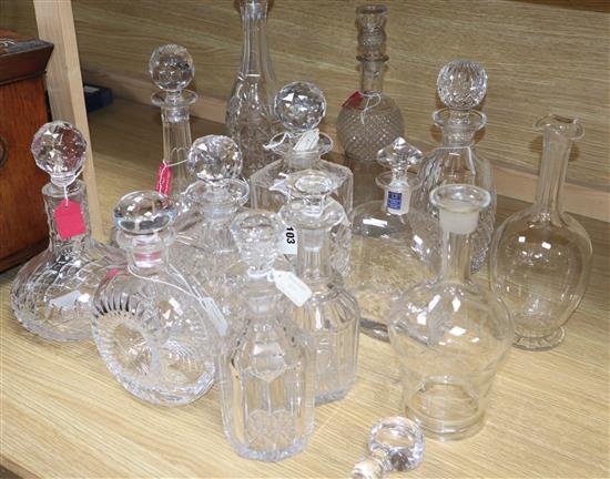 A collection of thirteen glass decanters